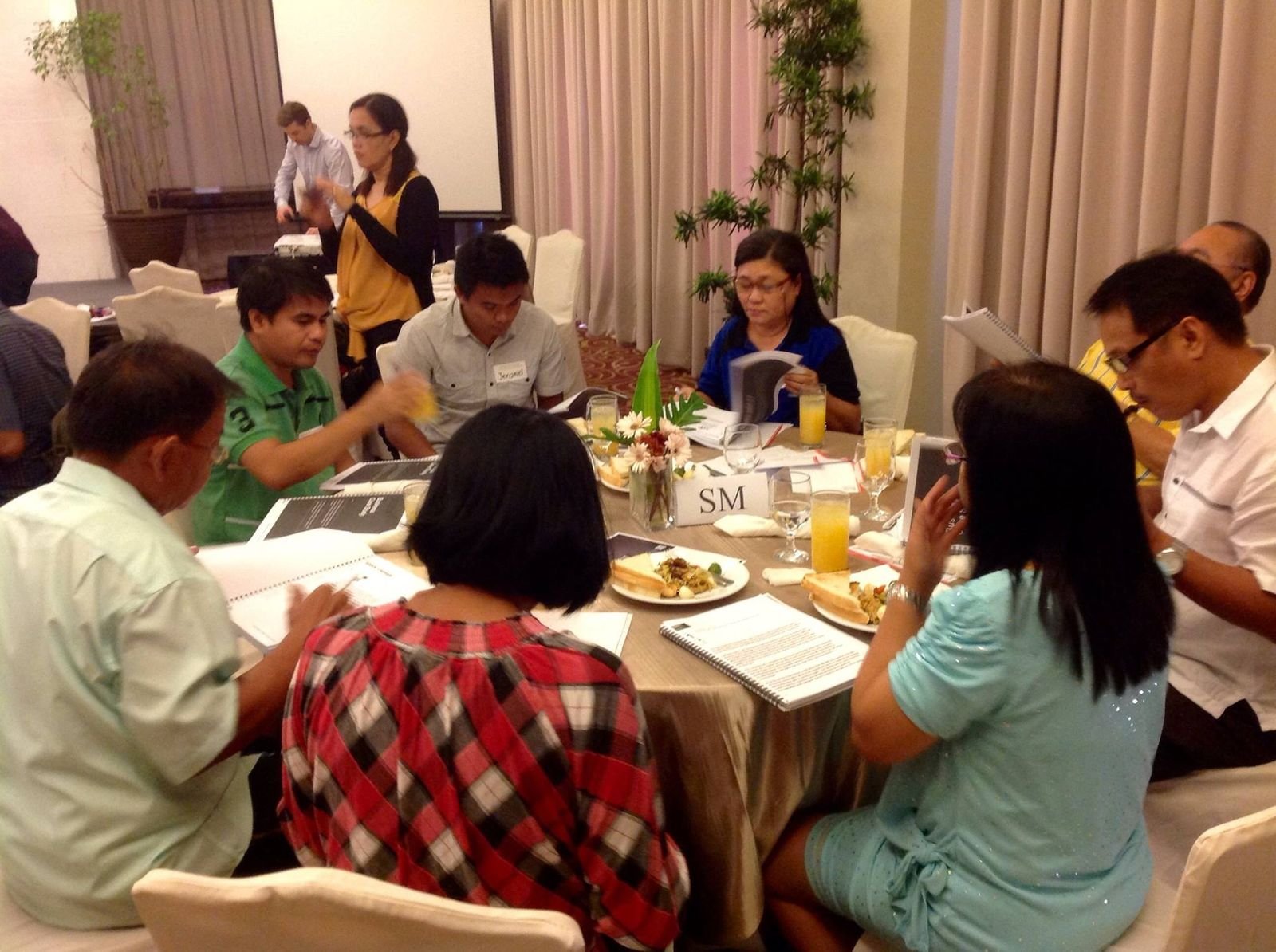 A small business competitiveness training session over breakfast at a hotel